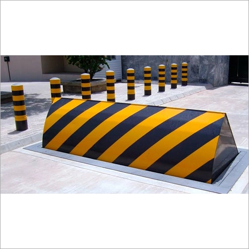 Heavy duty road blocker fitted behind a security boom barrier lane
